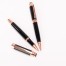 Set de Escritura "THORTON" negro con detalles encobrizados.