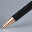 Bolígrafo de aluminio negro "STRONG", con terminales encobrizados.