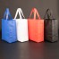 Bolsa TNT reutilizable "SAUL" con costuras termoselladas, asas 38 x 2.5 cm.